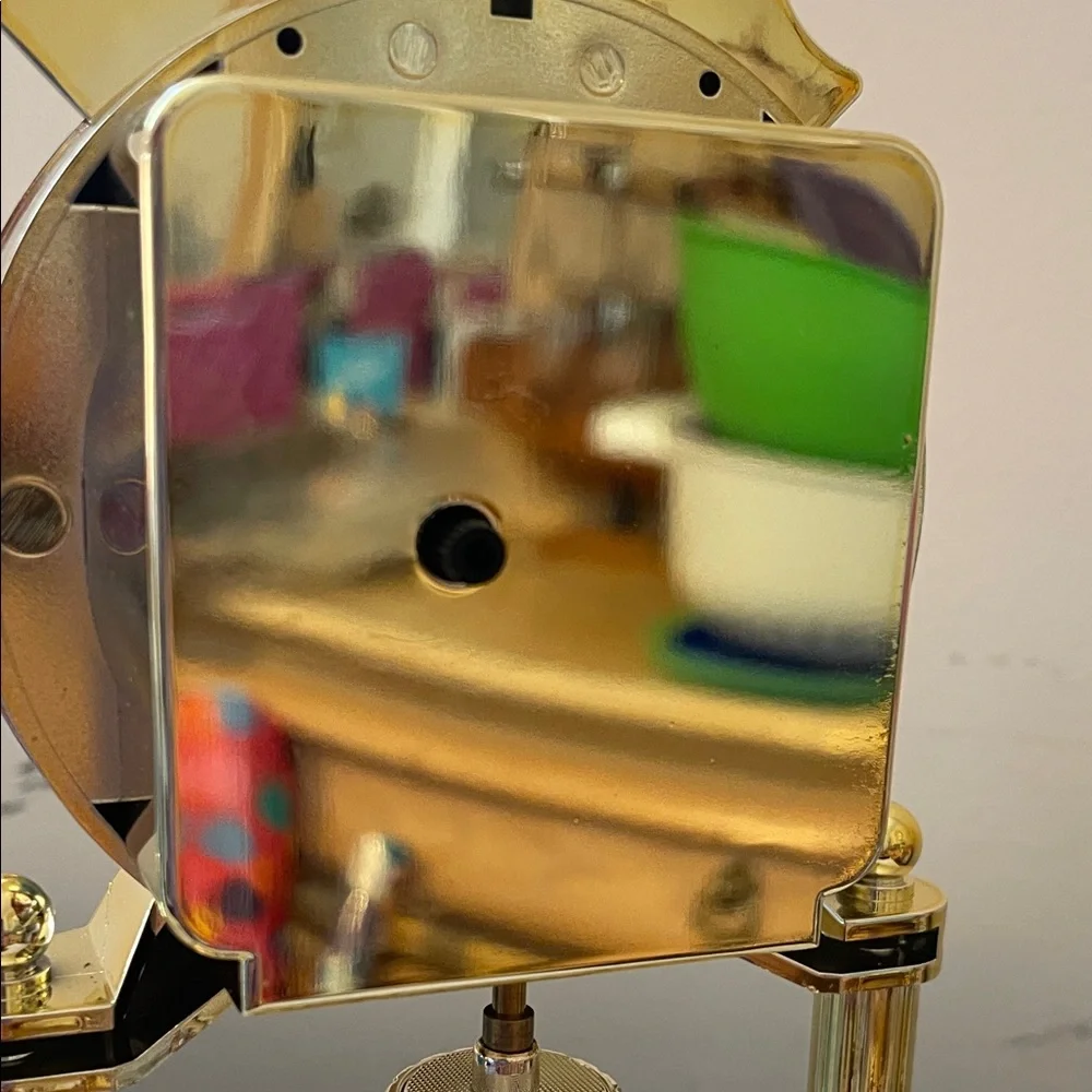Vtg MCM Rolfe Roberts German Anniversary Clock, Rotating Pendulum,Gold Tone
